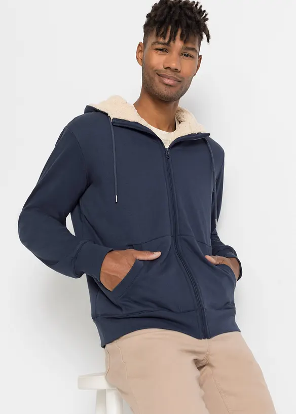 Thermo-Sweatjacke mit flauschigem Teddyfleece in blau von vorne (im Anschnitt) - bonprix