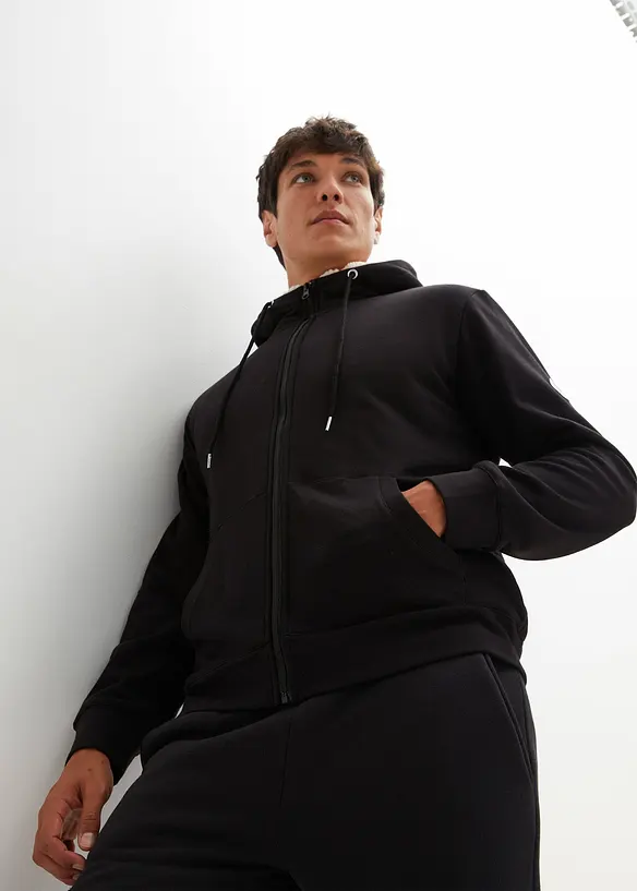 Thermo-Sweatjacke mit flauschigem Teddyfleece in schwarz von vorne (im Anschnitt) - bonprix