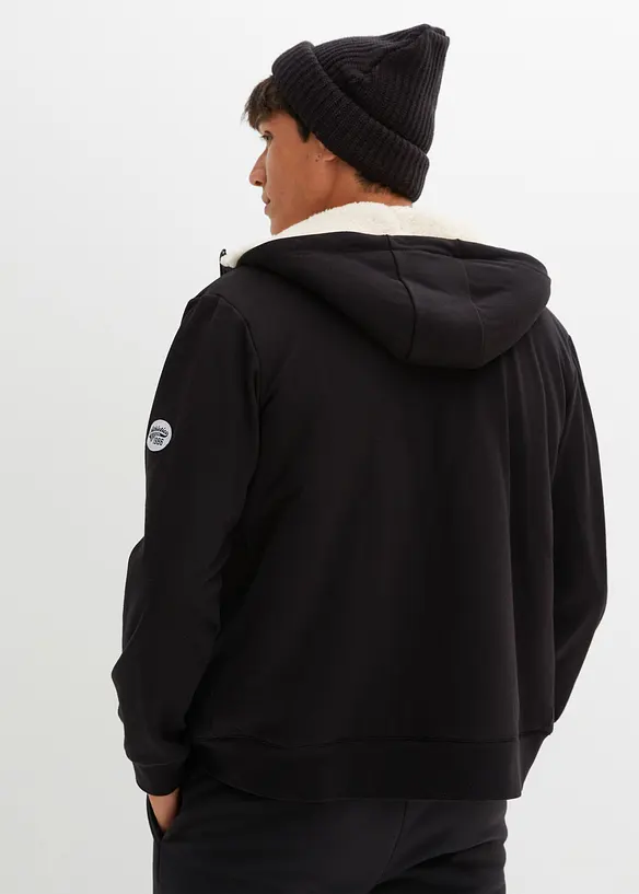 Thermo-Sweatjacke mit flauschigem Teddyfleece in schwarz von hinten (im Anschnitt) - bonprix