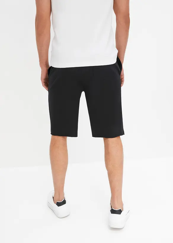 Sweat-Bermuda aus reiner Bio Baumwolle, Loose Fit in schwarz von hinten - bonprix