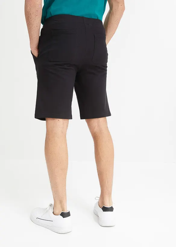 Sweat-Bermuda mit Dehnbund in Regular Fit in schwarz von hinten - bonprix