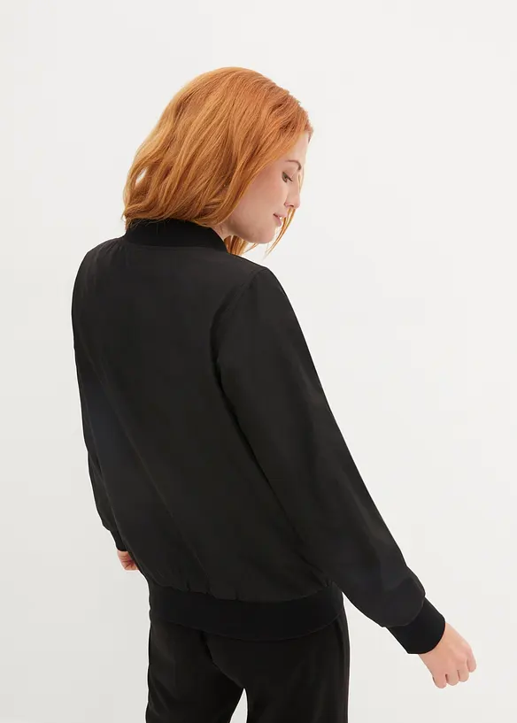 Oversize Blouson in schwarz von hinten (im Anschnitt) - bonprix