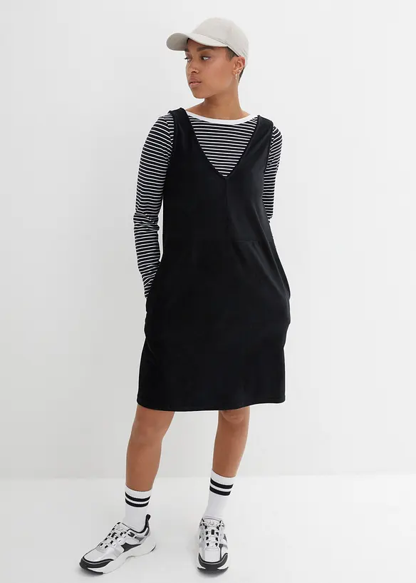 Latzkleid aus elastischem Cord in schwarz von vorne (Totalaufnahme) - bonprix Latzkleid aus elastischem Cord in schwarz von vorne (Totalaufnahme) - bonprix