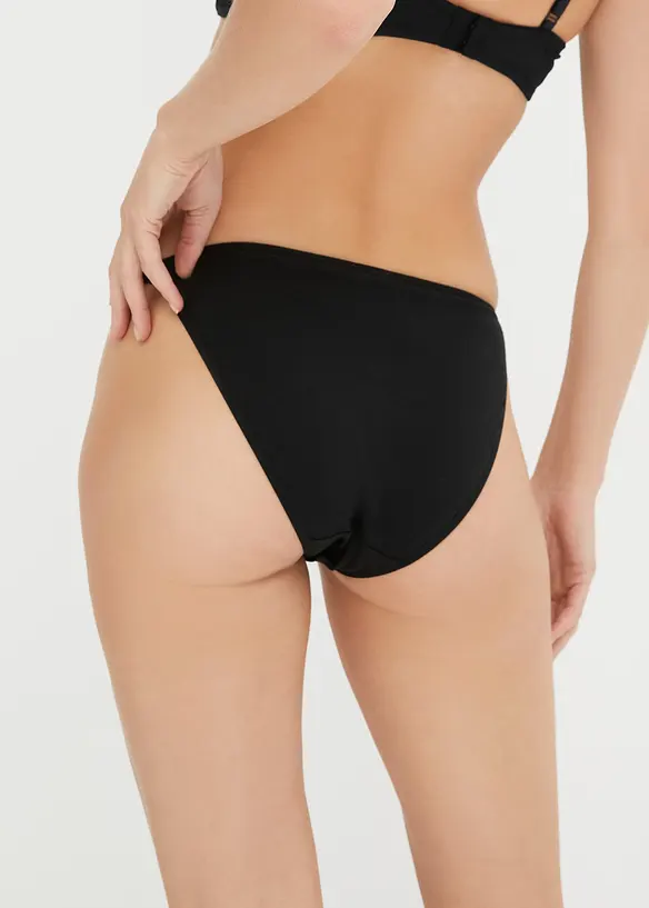 Tanga Minislip mit Bio-Baumwolle (5er Pack) in schwarz von hinten - bonprix