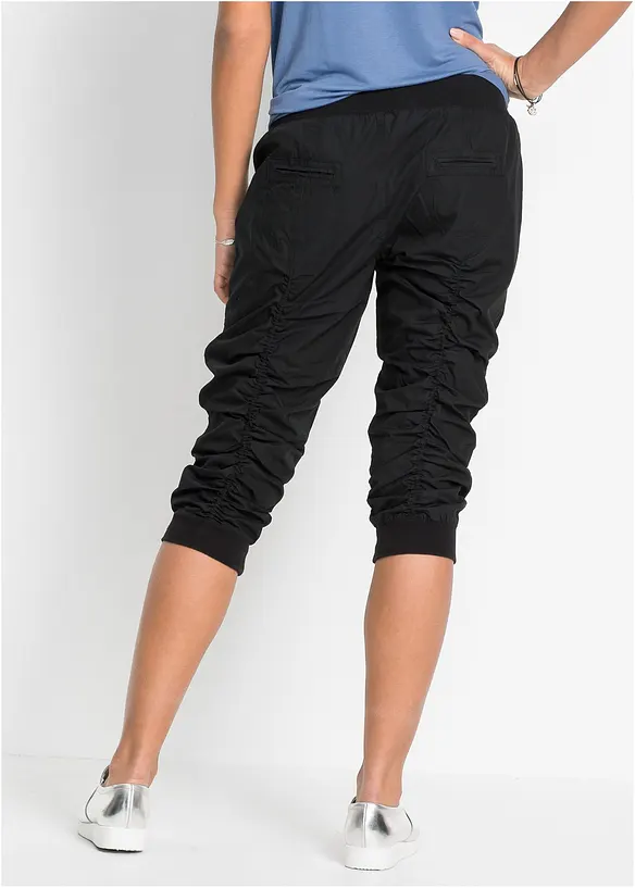 Bequeme Capri-Hose in schwarz von hinten - bonprix
