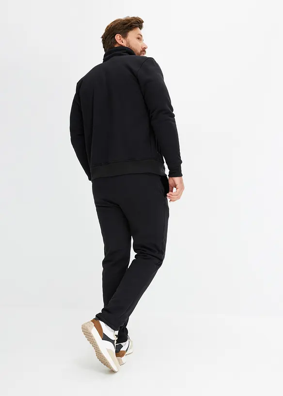 Thermo-Jogginganzug mit flauschigem Teddyfleece in schwarz von hinten (Totalaufnahme) - bonprix