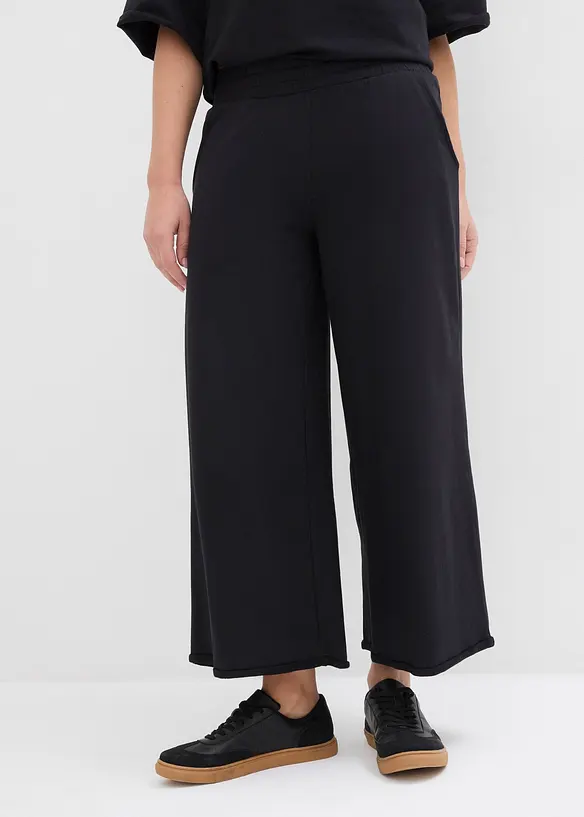Weite Sweathose aus reiner Bio-Baumwolle, 7/8 Länge in schwarz von vorne - bonprix