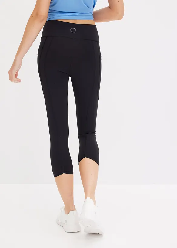 Komfort-Sport-Caprileggings mit Handytasche, schnelltrocknend in schwarz von hinten - bonprix