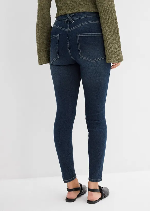 Skinny Jeans Mid Waist, Stretch in blau von hinten - bonprix