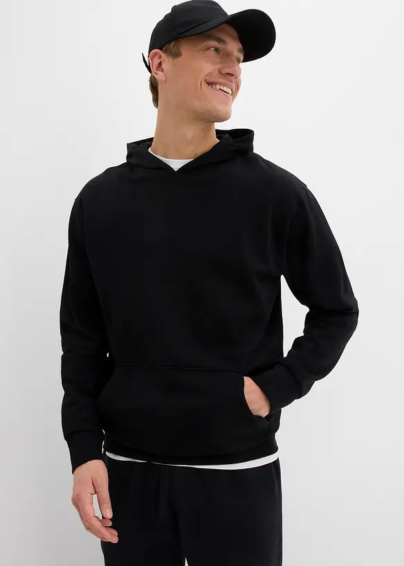 Hoodie in Loose Fit in schwarz von vorne (im Anschnitt) - bonprix
