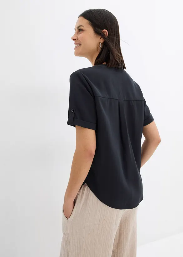 Kurzarmbluse aus festem Viskose-Mix in schwarz von hinten (im Anschnitt) - bonprix