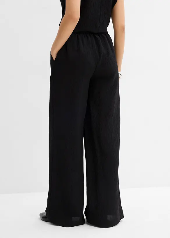 Hose aus strukturiertem Crinkle-Viskose-Mix in schwarz von hinten - bonprix