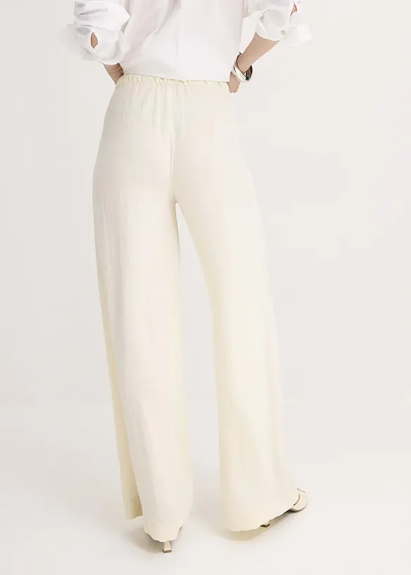 Marlenehose aus leichtem Crêpe in beige von hinten - bonprix