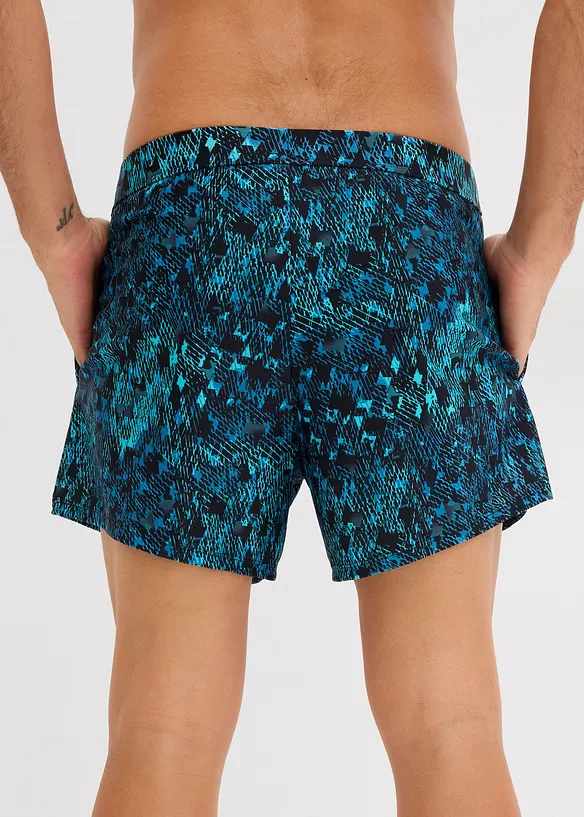 Badeshorts aus elastischem Material in schwarz von hinten - bonprix