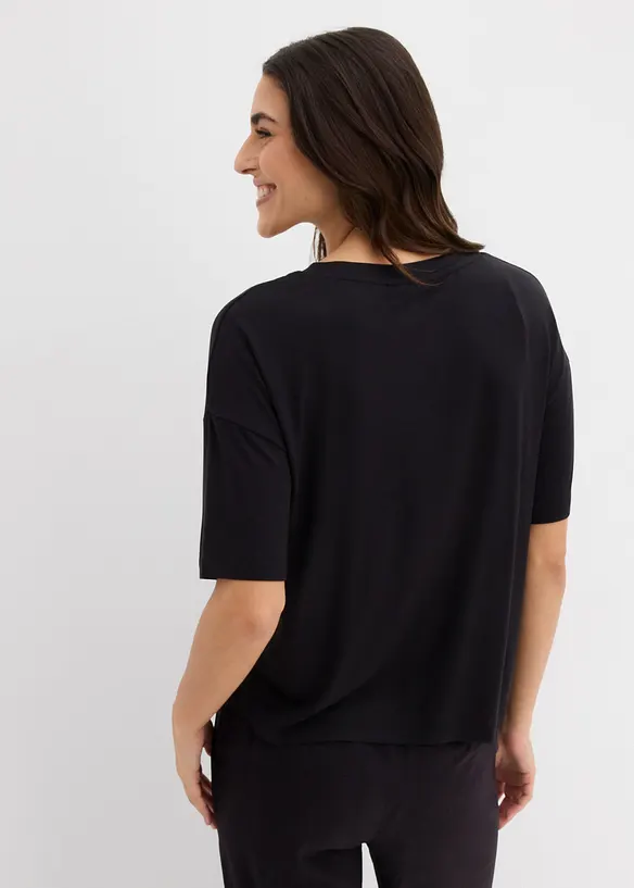 Verkürztes Shirt aus elastischem Viskose-Mix in schwarz von hinten (im Anschnitt) - bonprix Verkürztes Shirt aus elastischem Viskose-Mix in schwarz von hinten (im Anschnitt) - bonprix