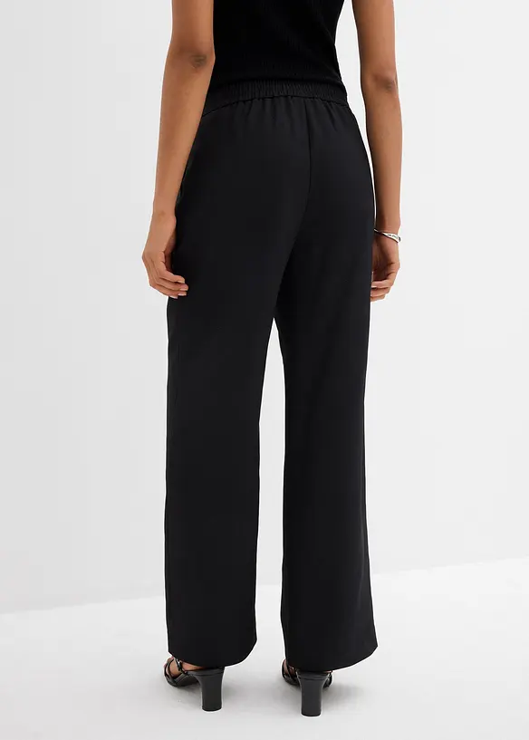 Schlupfhose mit Twill-Struktur in schwarz von hinten - bonprix