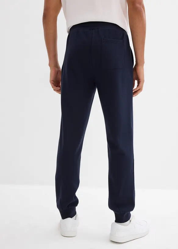 Jogginghose in Regular Fit in blau von hinten - bonprix