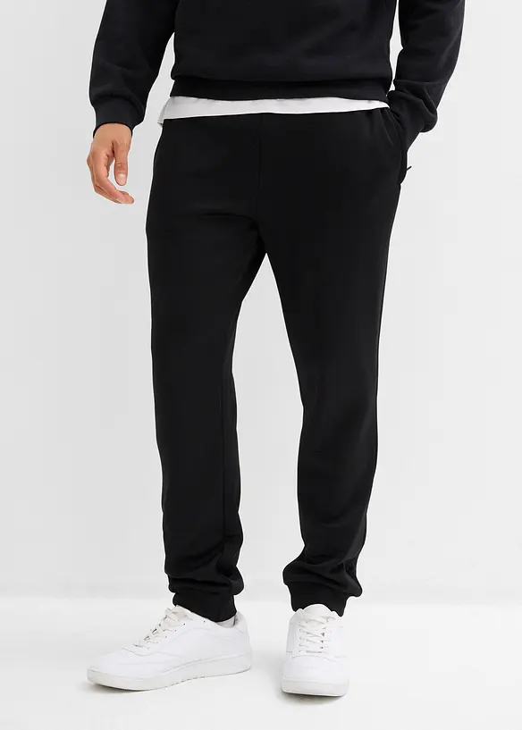 Thermo-Jogginghose mit Reißverschlusstaschen in schwarz von vorne - bonprix