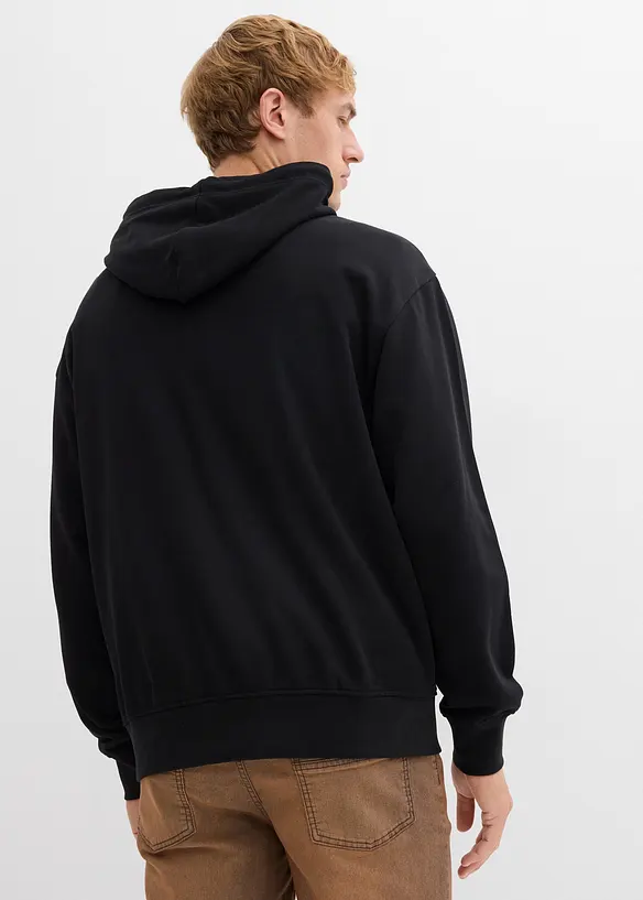 Hoodie in Loose Fit in schwarz von hinten (im Anschnitt) - bonprix