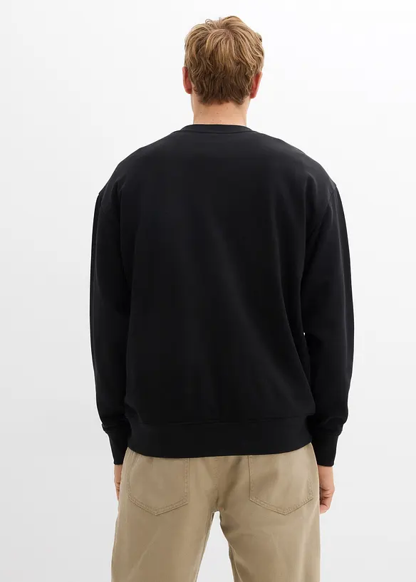 Oversize-Sweatshirt aus reiner Bio-Baumwolle in schwarz von hinten (im Anschnitt) - bonprix
