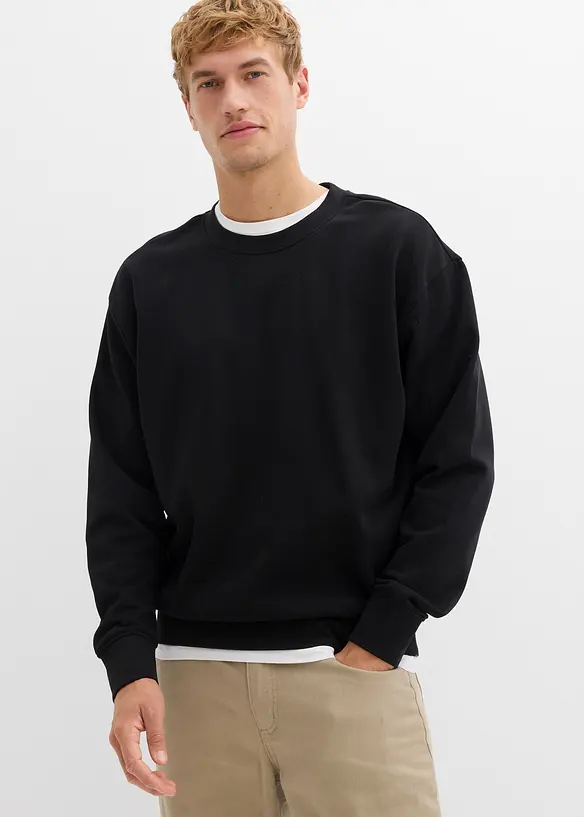Oversize-Sweatshirt aus reiner Bio-Baumwolle in schwarz von vorne (im Anschnitt) - bonprix