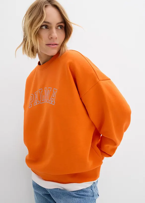 Oversize-Sweatshirt aus Baumwoll-Mix in orange von vorne (im Anschnitt) - bonprix