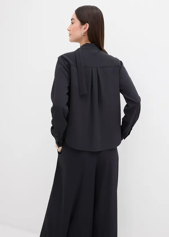 Leicht glänzendes Blusenshirt in schwarz von hinten (im Anschnitt) - bonprix Leicht glänzendes Blusenshirt in schwarz von hinten (im Anschnitt) - bonprix