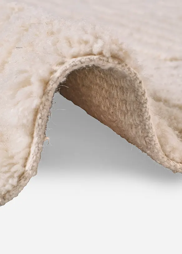 Woll Teppich mit Hoch-Tiefstruktur und Fransen in beige (Detailaufnahme) - bonprix