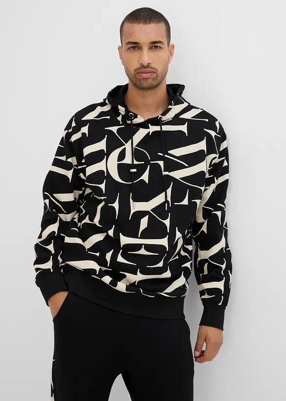 Kapuzensweatshirt in Loose Fit in schwarz von vorne (im Anschnitt) - bonprix
