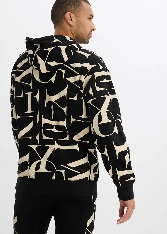 Kapuzensweatshirt in Loose Fit in schwarz von hinten (im Anschnitt) - bonprix
