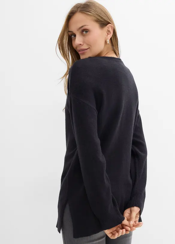 Oversize Longpullover mit Seitenschlitzen in schwarz von hinten (im Anschnitt) - bonprix
