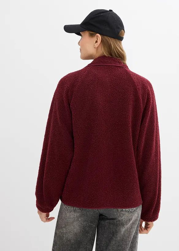 Umstands- und Tragejacke aus Teddyfleece in rot von hinten (im Anschnitt) - bonprix