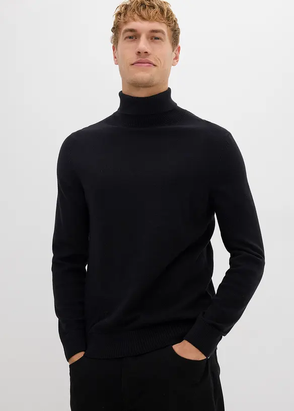 Feinstrick-Rollkragenpullover mit edler Merinowolle, Slim-Fit in schwarz von vorne (im Anschnitt) - bonprix