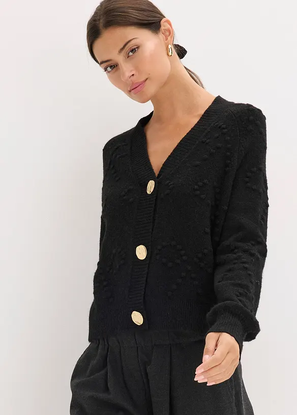 Texturierte Strickjacke in schwarz von vorne (im Anschnitt) - bonprix