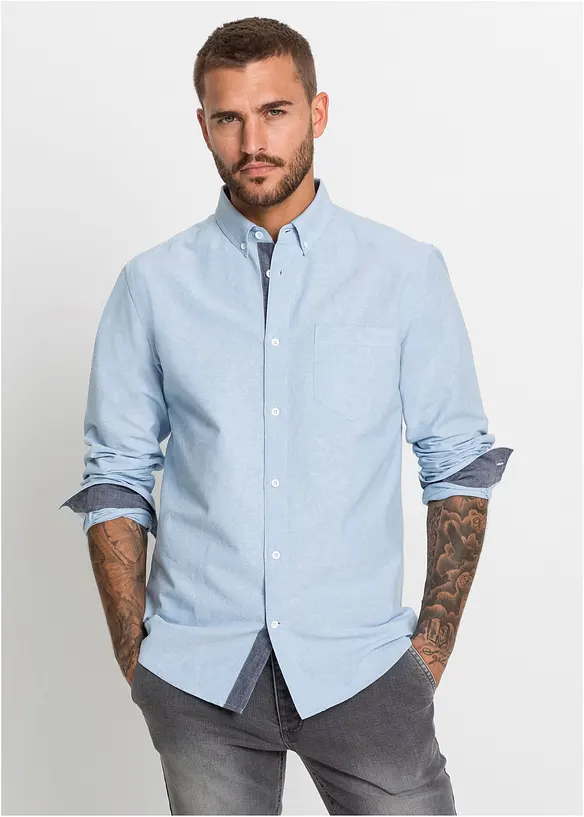 Business-Oxfordhemd aus Baumwolle in Regular-Fit in blau von vorne (im Anschnitt) - bonprix