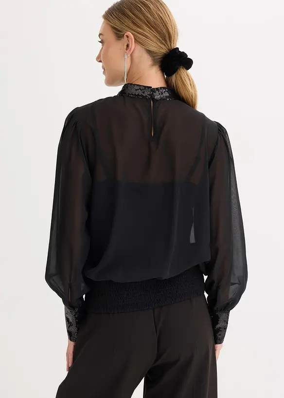 Blusenshirt aus feinem Tüll mit Pailletten in schwarz von hinten (im Anschnitt) - bonprix