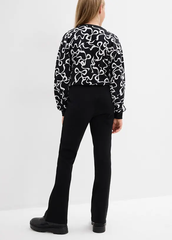 Ausgestellte Hose aus festem Baumwoll-Jersey in schwarz von hinten - bonprix
