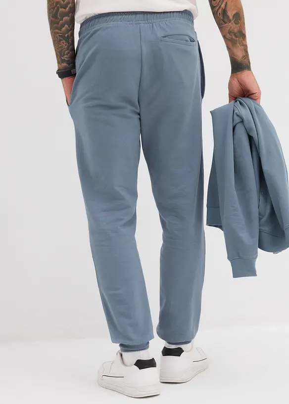 Jogginghose aus weichem Baumwollmix in blau von hinten - bonprix