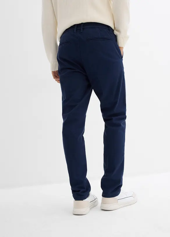 Regular Fit Chinohose mit Thermo-Flanellfutter, Tapered in blau von hinten - bonprix