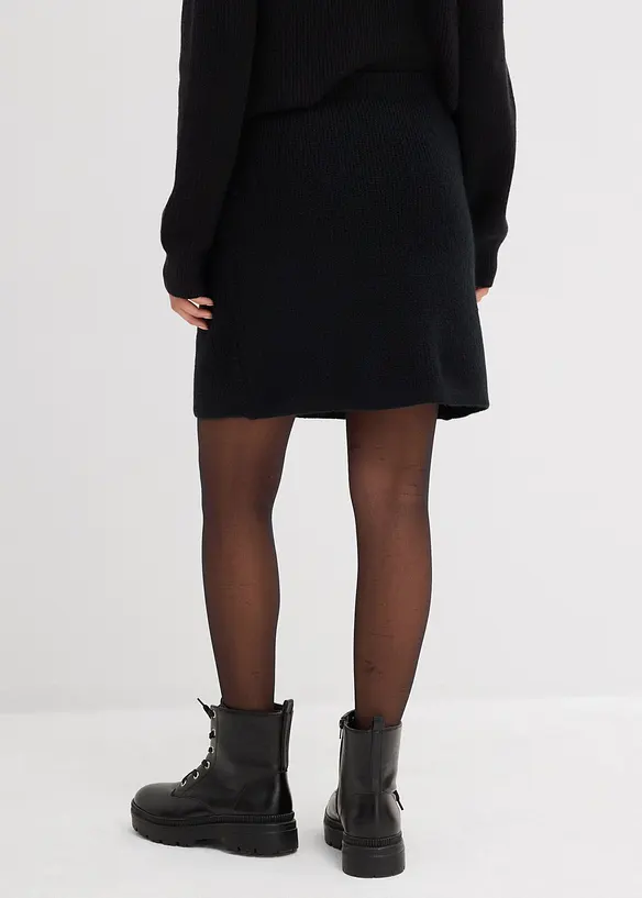 Kurzer Strickrock in schwarz von hinten - bonprix