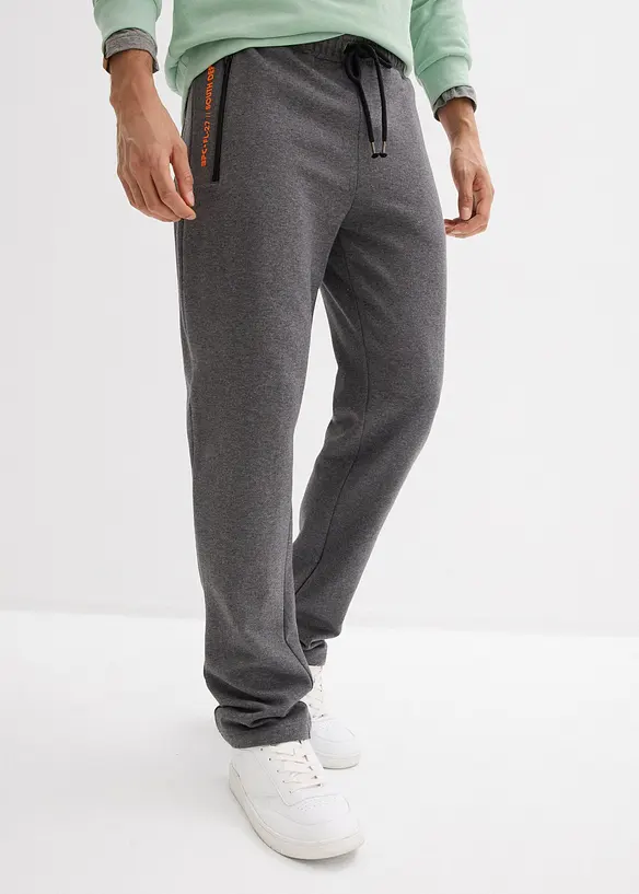 Jogginghose mit Reißverschlusstaschen in grau von vorne - bonprix