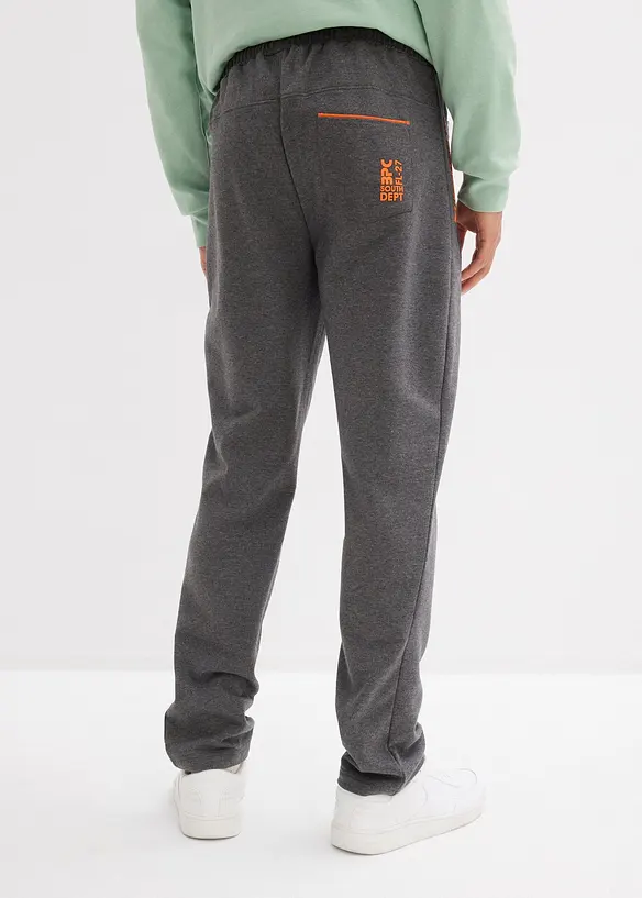 Jogginghose mit Reißverschlusstaschen in grau von hinten - bonprix