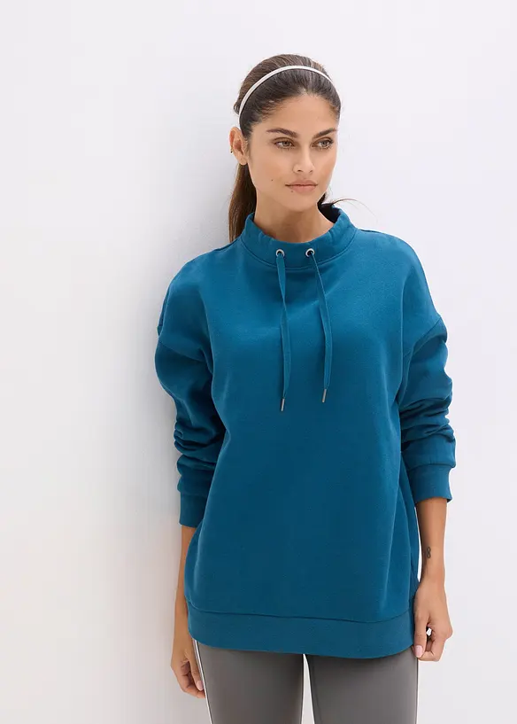 Sweatshirt aus reiner Bio-Baumwolle in petrol von vorne (im Anschnitt) - bonprix