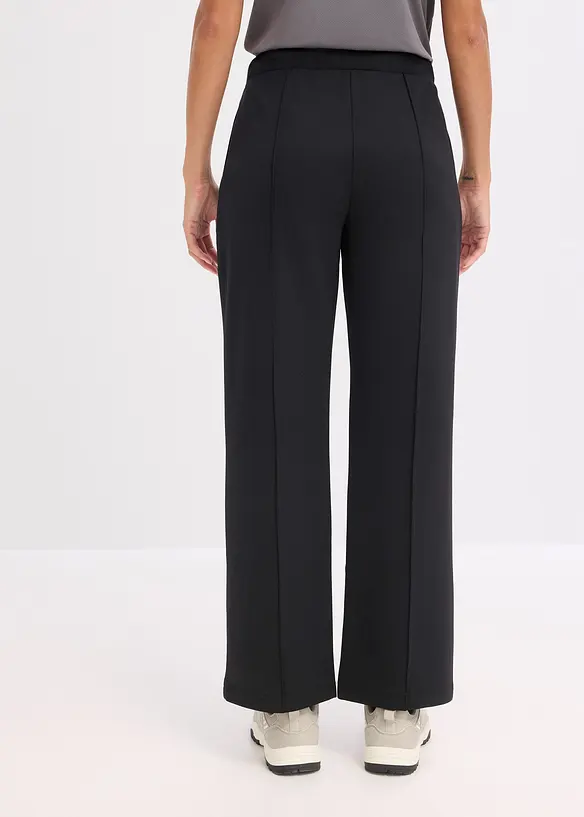 Sporthose mit Ziernähten in schwarz von hinten - bonprix