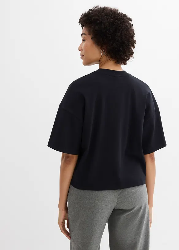 Kurzes Oversize-Shirt aus reiner schwerer Bio-Baumwolle in schwarz von hinten (im Anschnitt) - bonprix