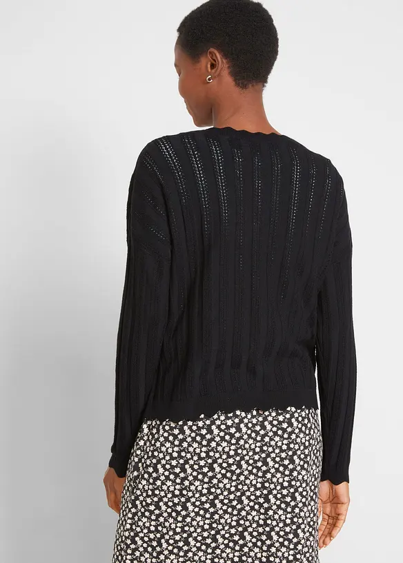Kurze Ajour-Strickjacke in schwarz von hinten (im Anschnitt) - bonprix
