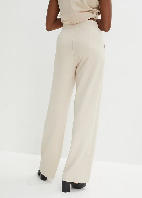 Schlupfhose aus fester Interlock-Qualität in beige von hinten - bonprix