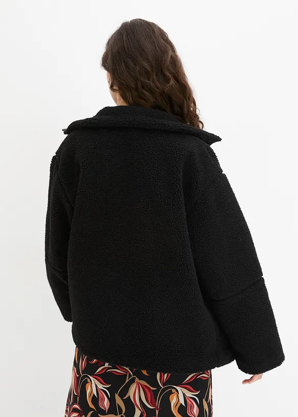 Gefütterte Teddy-Fleece-Jacke in schwarz von hinten (im Anschnitt) - bonprix