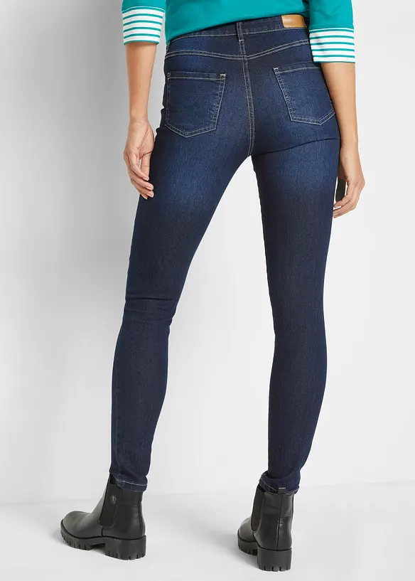 Skinny Jeans Mid Waist, Stretch in blau von hinten - bonprix