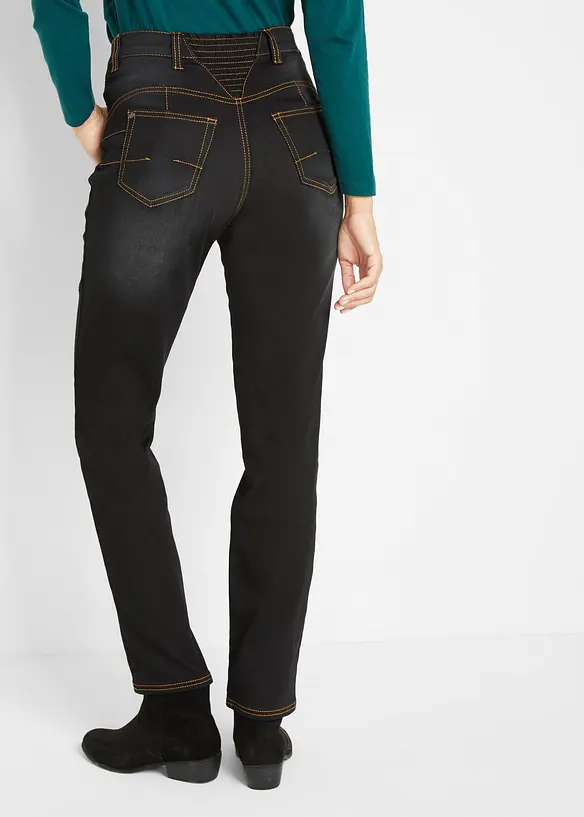 Wärmende Straight-Jeans, Mid Waist in schwarz von hinten - bonprix